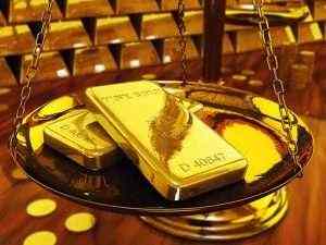 Золото теряет в цене на фоне укрепления доллара