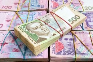 Минфин сообщил о росте госдолга Украины в декабре в долларах и гривне