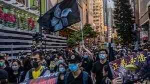 Hong Kong braces for more skirmishes as protesters paralyze the city