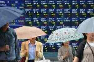 Asian shares soar as upbeat signals ease trade tensions