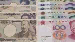Yen drops as virus risks lessen, yuan eases after rate cut