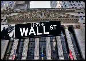 Wall Street reaches record closing highs amid coronavirus slowdown
