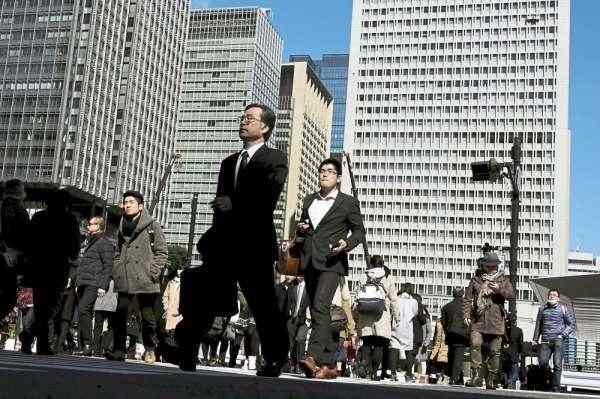 Japan’s economy falls in fourth quarter, recession risks grow