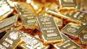 Gold climbs as doubts on US stimulus package weighs on market
