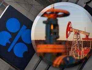 Oil prices climb above $1 as OPEC+ settles on record output cut