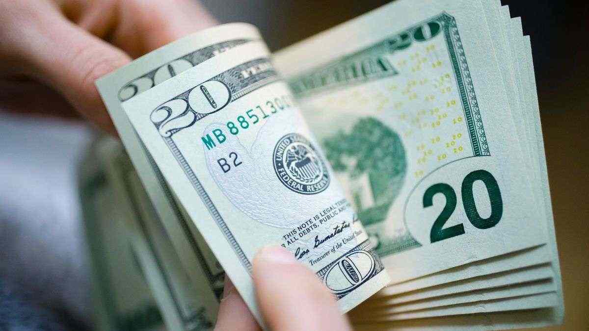 Dollar eases as vaccine trials lift risk appetite