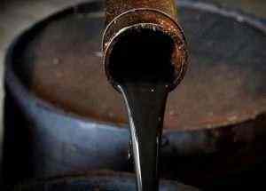 Oil prices slip amid surging COVID-19 cases