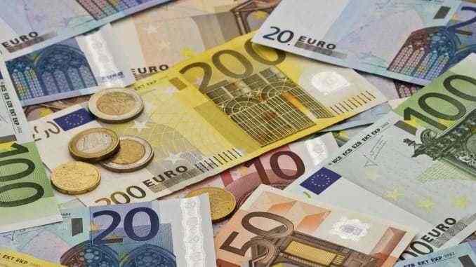 Euro firms as investors expect a boost in ECB stimulus