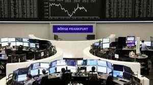 European shares trade lower after weak earnings reports