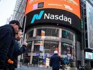 Nasdaq hits another record high as Wall Street rises with tech shares