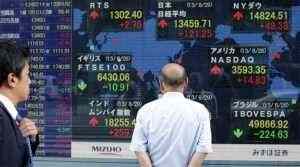 Asian stocks ease, data drags dollar