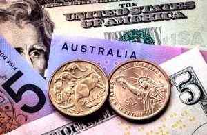 Dollar falls on Fed rate outlook, Aussie looks to RBA meeting
