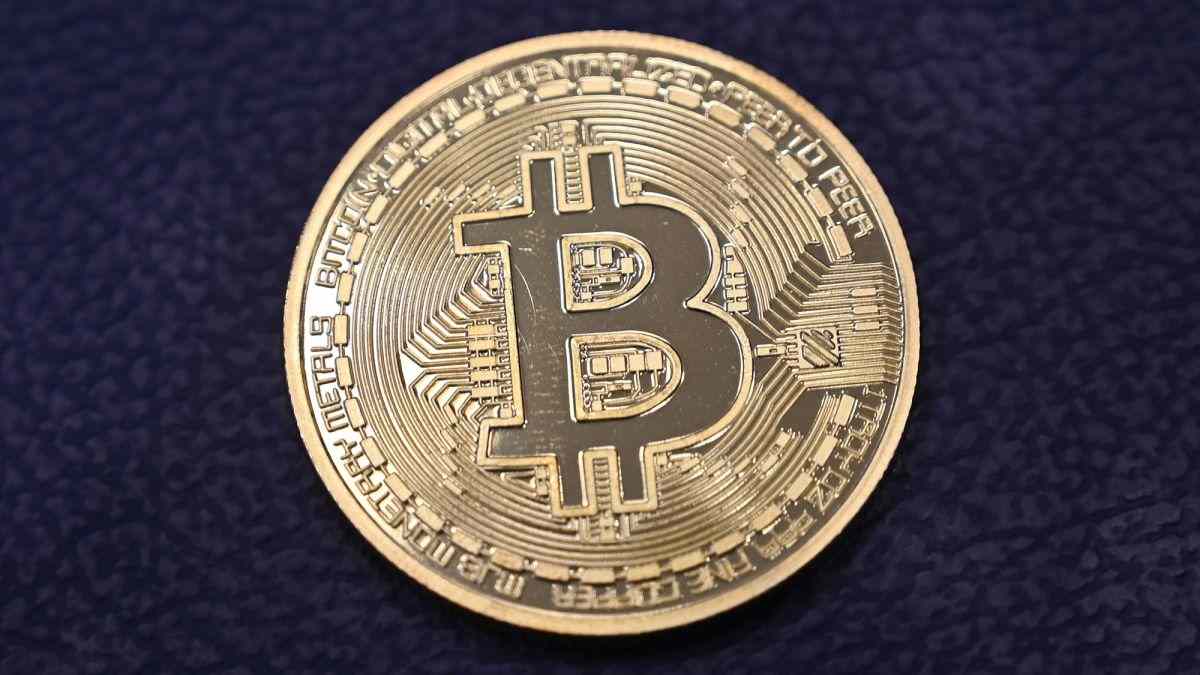 Bitcoin eases after near $62,000 hit