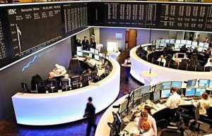 European stocks higher as central banks vow to ease monetary policy