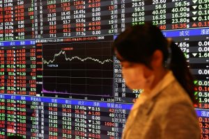 Asian shares climb on Wall Street; Chinese economy worries burden gains