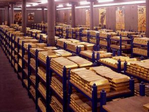 Gold up, remains near seven-week low