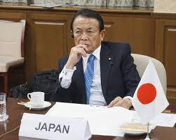 Japan’s outgoing finance minister pushes for inflation target cut